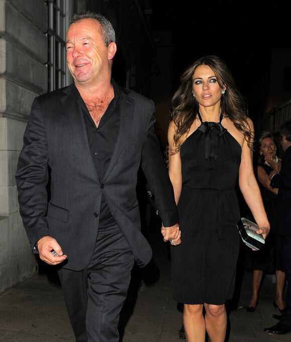 Elizabeth Hurley et son petit ami David Yarrow à Londres, le 30 avril 2014.