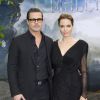 Le couple Angelina Jolie (en Atelier Versace) et Brad Pitt (en Gucci) - Avant-première du film "Maléfique" à Londres le 8 mai 2014