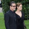 Angelina Jolie (en Atelier Versace) et Brad Pitt (en Gucci) - Avant-première du film "Maléfique" à Londres le 8 mai 2014