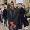 Djibril Cissé lors de son arrivée au défilé de mode Chloé collection prêt-à-porter Automne/Hiver 2014-2015 à Paris, le 2 mars 2014
