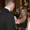 Kate Moss toute chose devant le prince William, le 13 mai 2014 au château de Windsor, lors d'une soirée de bienfaisance au profit du Royal Marsden Hospital dont le duc de Cambridge est le président, organisée avec Ralph Lauren.