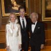 Ralph Lauren avec sa femme Ricky et Benedict Cumberbatch, le 13 mai 2014 au château de Windsor, lors d'une soirée de bienfaisance au profit du Royal Marsden Hospital dont le duc de Cambridge est le président, organisée avec Ralph Lauren.