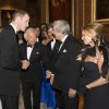 Le prince William avec Ralph Lauren et des invités, le 13 mai 2014 au château de Windsor, lors d'une soirée de bienfaisance au profit du Royal Marsden Hospital dont le duc de Cambridge est le président, organisée avec Ralph Lauren.