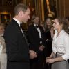 Le prince William et Emma Watson, le 13 mai 2014 au château de Windsor, lors d'une soirée de bienfaisance au profit du Royal Marsden Hospital dont le duc de Cambridge est le président, organisée avec Ralph Lauren.