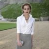 Emma Watson posant à son arrivée au château de Windsor, le 13 mai 2014, pour le gala au profit du Royal Marsden Hospital organisé par le prince William et Ralph Lauren.