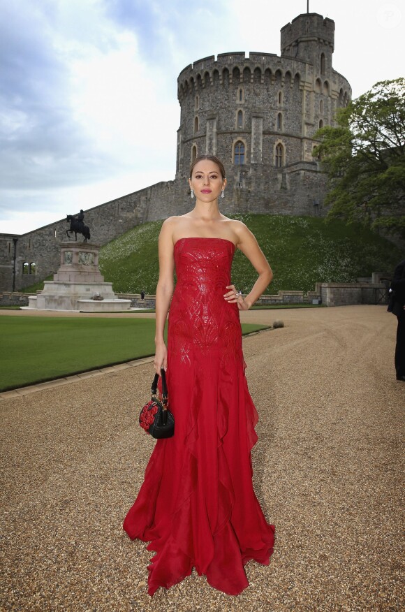 Jessica Michibata, fiancée de Jenson Button, posant à son arrivée au château de Windsor, le 13 mai 2014, pour le gala au profit du Royal Marsden Hospital organisé par le prince William et Ralph Lauren.