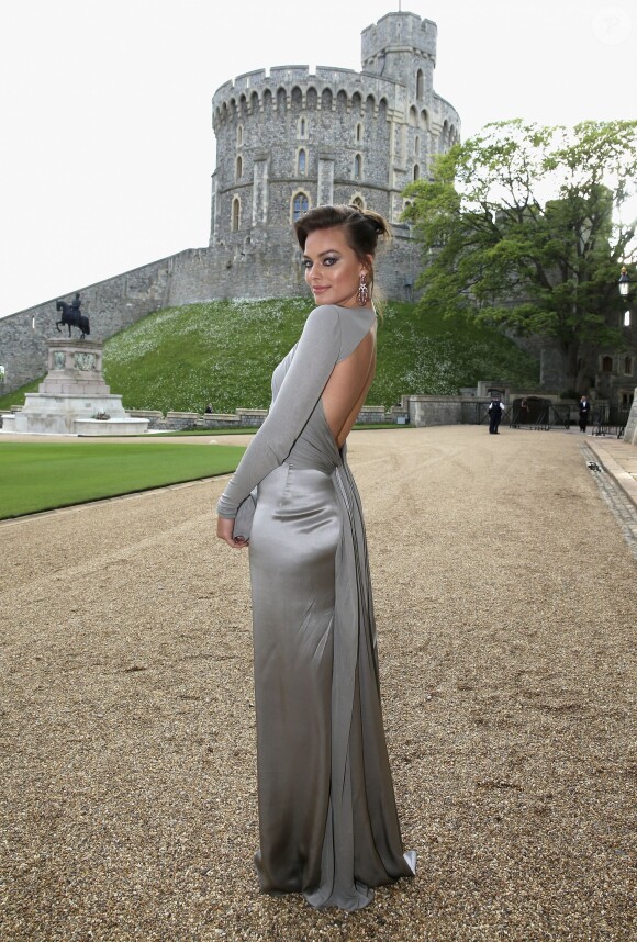 Margot Robbie posant à son arrivée au château de Windsor, le 13 mai 2014, pour le gala au profit du Royal Marsden Hospital organisé par le prince William et Ralph Lauren.