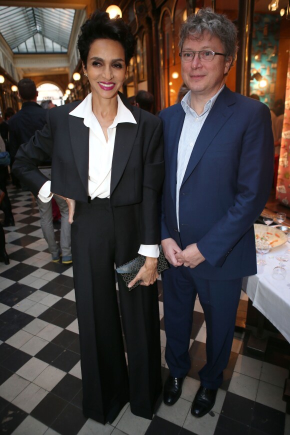 Farida Khelfa et son mari Henri Seydoux au vernissage de l'exposition "Voilà chéri !" de Gloria von Thurn und Taxis à la galerie du passage à Paris le 14 mai 2014.