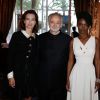 Carole Bouquet, Jacques Attali et Aïssa Maiga lors de la 4ème édition du Gala "PlaNet Finance" au Carlton lors du 67ème festival international du film de Cannes le 15 mai 2014