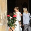 Cara Delevingne lors du mariage de Poppy Delevingne et James Cook en l'église St Paul à Londres, le 16 mai 2014.