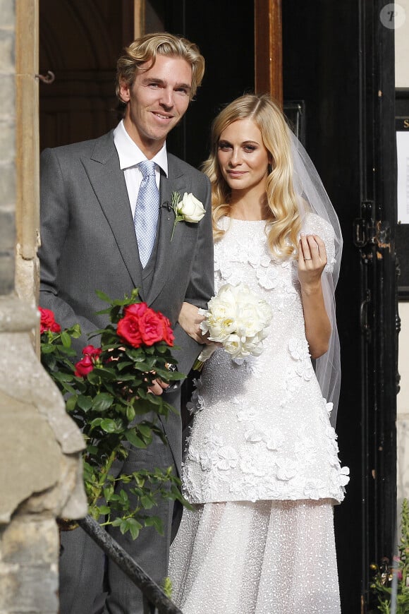 James Cook et Poppy Delevingne lors de leur mariage en l'église St Paul à Londres, le 16 mai 2014.