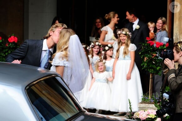 Poppy Delevingne et James Cook lors de leur mariage à Londres, le 16 mai 2014.
