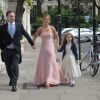 Geri Halliwell, son compagnon Christina Horner et sa fille Bluebell se rendent au mariage de Poppy Delevingne et de James Cook en l'église de "St Paul's" à Londres, le 16 mai 2014.