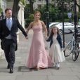  Geri Halliwell, son compagnon Christina Horner et sa fille Bluebell se rendent au mariage de Poppy Delevingne et de James Cook en l'&eacute;glise de "St Paul's" &agrave; Londres, le 16 mai 2014. 