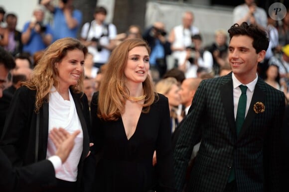 Julie Gayet, Mika lors de la montée des marches du film Saint Laurent et l'hommage au cinéma d'animation au Festival de Cannes le 17 mai 2014