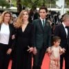 Lisa Azuelos, Julie Gayet, Mika et la fille de Salma Hayek, Valentina Pinault lors de la montée des marches du film Saint Laurent et l'hommage au cinéma d'animation au Festival de Cannes le 17 mai 2014