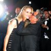 Rosie Huntington-Whiteley et Roberto Cavalli lors de la soirée organisée par le créateur de mode italien, sur le yacht Sirocco Douglas. Cannes, le 21 mai 2014.