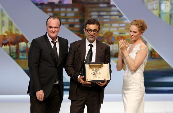 Quentin Tarantino et Uma Thurman remettent la Palme d'Or à Nuri Bilge Ceylan pour son film "Winter Sleep" - Cérémonie de clôture du 67e Festival du film de Cannes le 24 mai 2014.
