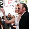 Quentin Tarantino, gominé, et Uma Thurman - Montée des marches du film "Pour une poignée de dollars" pour la cérémonie de clôture du 67e Festival du film de Cannes le 24 mai 2014