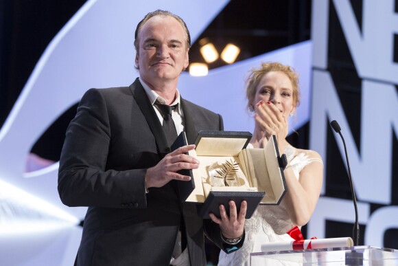 Quentin Tarantino, cheveux gominés, et Uma Thurman - Cérémonie de clôture du 67e Festival du film de Cannes le 24 mai 2014