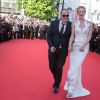 Quentin Tarantino et Uma Thurman, dans une robe Marchesa - Montée des marches du film "Pour une poignée de dollars" pour la cérémonie de clôture du 67e Festival du film de Cannes le 24 mai 2014