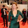 Léa Seydoux, habillée d'une robe Prada, foule le tapis rouge du Palais des Festivals lors de la projection du film Saint Laurent. Cannes, le 17 mai 2014.