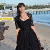 Exclusif - Monica Bellucci prend la pose sur la plage Magnum à l'occasion du 67e festival de Cannes à Cannes le 18 mai 2014.