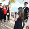 Exclusif - Rencontre avec Monica Bellucci sur la plage Magnum à Cannes le 18 mai 2014.