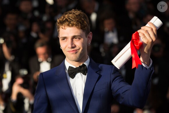 Xavier Dolan (Prix du jury pour "Mommy") - Photocall de la remise des palmes du 67e Festival du film de Cannes, le 24 mai 2014.