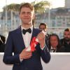 Xavier Dolan (Prix du jury pour "Mommy") - Photocall de la remise des palmes du 67e Festival du film de Cannes, le 24 mai 2014.