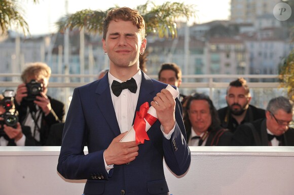Xavier Dolan (Prix du jury pour "Mommy") - Photocall de la remise des palmes du 67e Festival du film de Cannes, le 24 mai 2014.