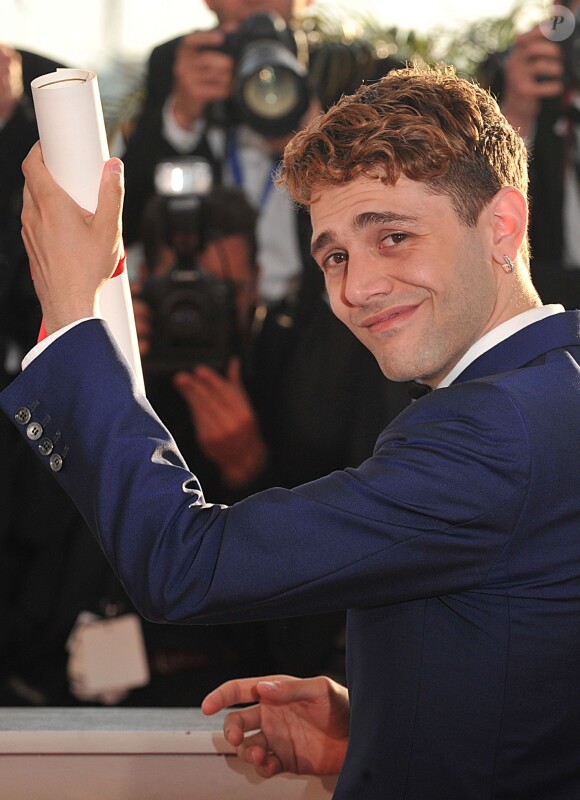 Xavier Dolan (Prix du jury pour "Mommy") - Photocall de la remise des palmes du 67e Festival du film de Cannes, le 24 mai 2014.