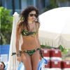 La chanteuse Eliza Doolittle profite d'une journée ensoleillée sur une plage de Miami, le 27 mai 2014.