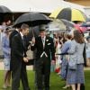 Le duc d'Edimbourg lors de la pluvieuse troisième garden party de l'année organisée à Buckingham Palace le 3 juin 2014.