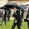 Le duc d'Edimbourg lors de la pluvieuse troisième garden party de l'année organisée à Buckingham Palace le 3 juin 2014.