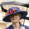 La princesse Alexandra de Kent lors de la pluvieuse troisième garden party de l'année organisée par sa cousine Elizabeth II à Buckingham Palace le 3 juin 2014.