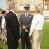 Le duc de Kent lors d'une embellie pendant la pluvieuse troisième garden party de l'année organisée à Buckingham Palace le 3 juin 2014.