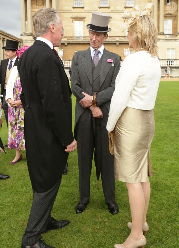 Le duc de Kent lors d'une embellie pendant la pluvieuse troisième garden party de l'année organisée à Buckingham Palace le 3 juin 2014.