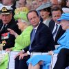 Le roi Harald de Norvège, la reine Elisabeth II d'Angleterre, François Hollande et la reine Margrethe de Danemark - Cérémonie de commémoration du 70e anniversaire du débarquement sur la plage Sword Beach à Ouistreham, le 6 juin 2014.