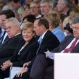Vladimir Poutine, Milos Zeman, Angela Merkel et Petro Porochenko (Président de l'Ukraine) - Cérémonie de commémoration du 70e anniversaire du débarquement sur la plage Sword Beach à Ouistreham, le 6 juin 2014.