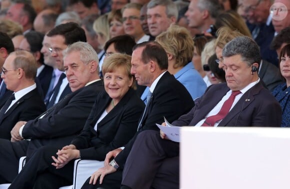 Vladimir Poutine, Milos Zeman, Angela Merkel et Petro Porochenko (Président de l'Ukraine) - Cérémonie de commémoration du 70e anniversaire du débarquement sur la plage Sword Beach à Ouistreham, le 6 juin 2014.