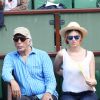 Gérard Darmon et une amie à la finale homme des Internationaux de France de tennis de Roland Garros à Paris le 8 juin 2014