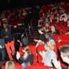 Exclusif - Thomas Ngijol passe devant sa compagne Karole Rocher et leur fille lors de l'avant-première du film "Fastlife" au cinéma Gaumont Marignan dans le cadre du 3e Champs-Elysées Film Festival à Paris, le 11 juin 2014.