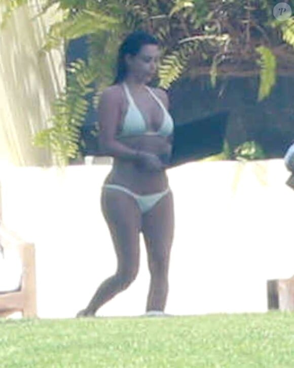 Kim Kardashian dévoile son incroyable silhouette au Mexique à Puerto Vallarta. 10 juin 2014
Photo exclusive