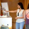 Kim Kardashian fait du shopping dans une boutique de vêtements. New York, le 17 juin 2014.