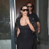 Kim Kardashian quitte l'appartement de Kanye West avec Jonathan Cheban. New York, le 17 juin 2014.
