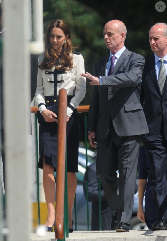 Kate Middleton, accueillie par des membres du Bletchley Park Trust, a procédé le 18 juin 2014 à la réouverture officielle de Bletchley Park, ancien centre de décryptage pendant la Seconde Guerre mondiale, après travaux de rénovation.