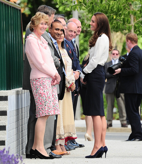Kate Middleton, duchesse de Cambridge, célébrait le 18 juin 2014 dans le Buckinghamshire la réouverture officielle après rénovation de Bletchley Park, ancien centre de décryptage de codes pendant la Seconde Guerre mondiale où sa défunte grand-mère Valerie Glassborow oeuvra.