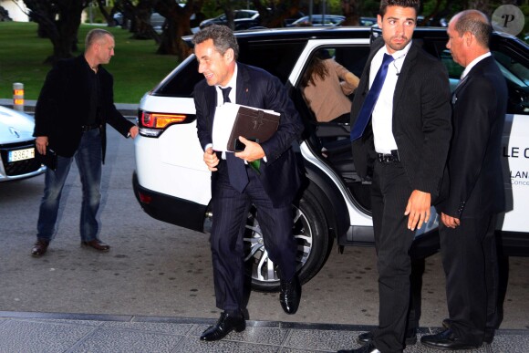 Carla Bruni et son mari Nicolas Sarkozy arrivent à Barcelone en Espagne le 18 juin 2014. Carla doit donné le dernier concert de sa tournée le 19 juin dans les jardins du Palau Reial de Pedralbes dans le cadre d'un festival.