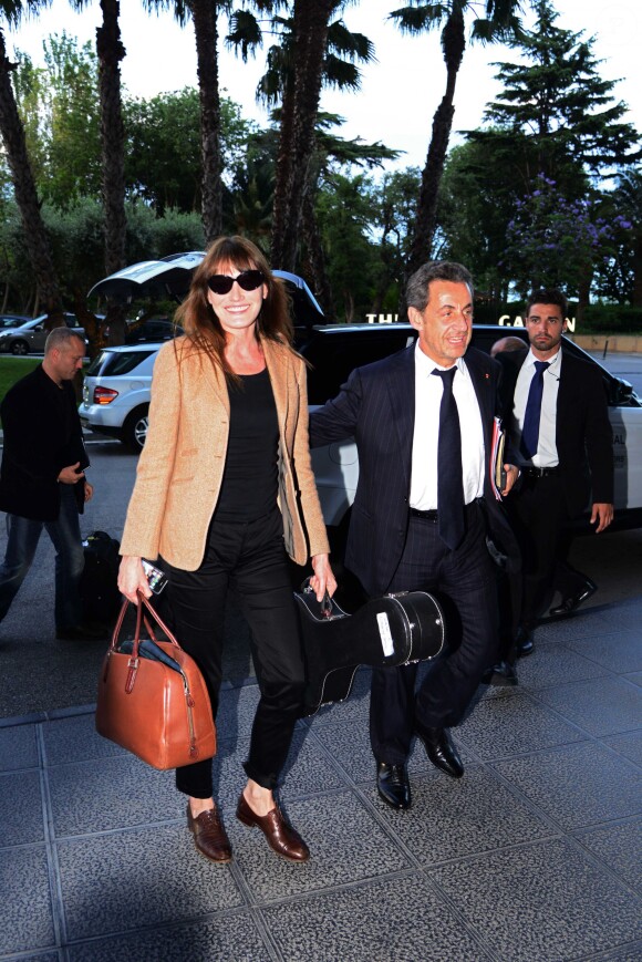 Carla Bruni et son mari Nicolas Sarkozy arrivent à Barcelone en Espagne le 18 juin 2014. Carla doit donné le dernier concert de sa tournée le 19 juin dans les jardins du Palau Reial de Pedralbes dans le cadre d'un festival.
